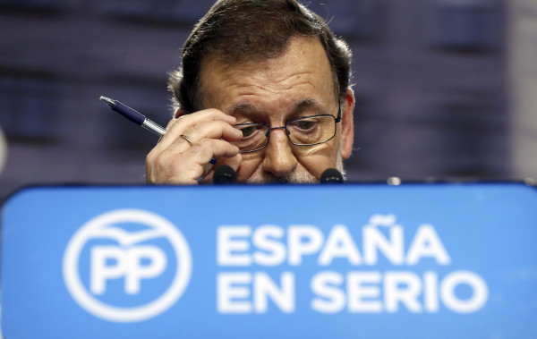 PP, de Mariano Rajoy, perdeu maioria absoluta no Parlamento da Espanha. EFE /Kiko Huesca